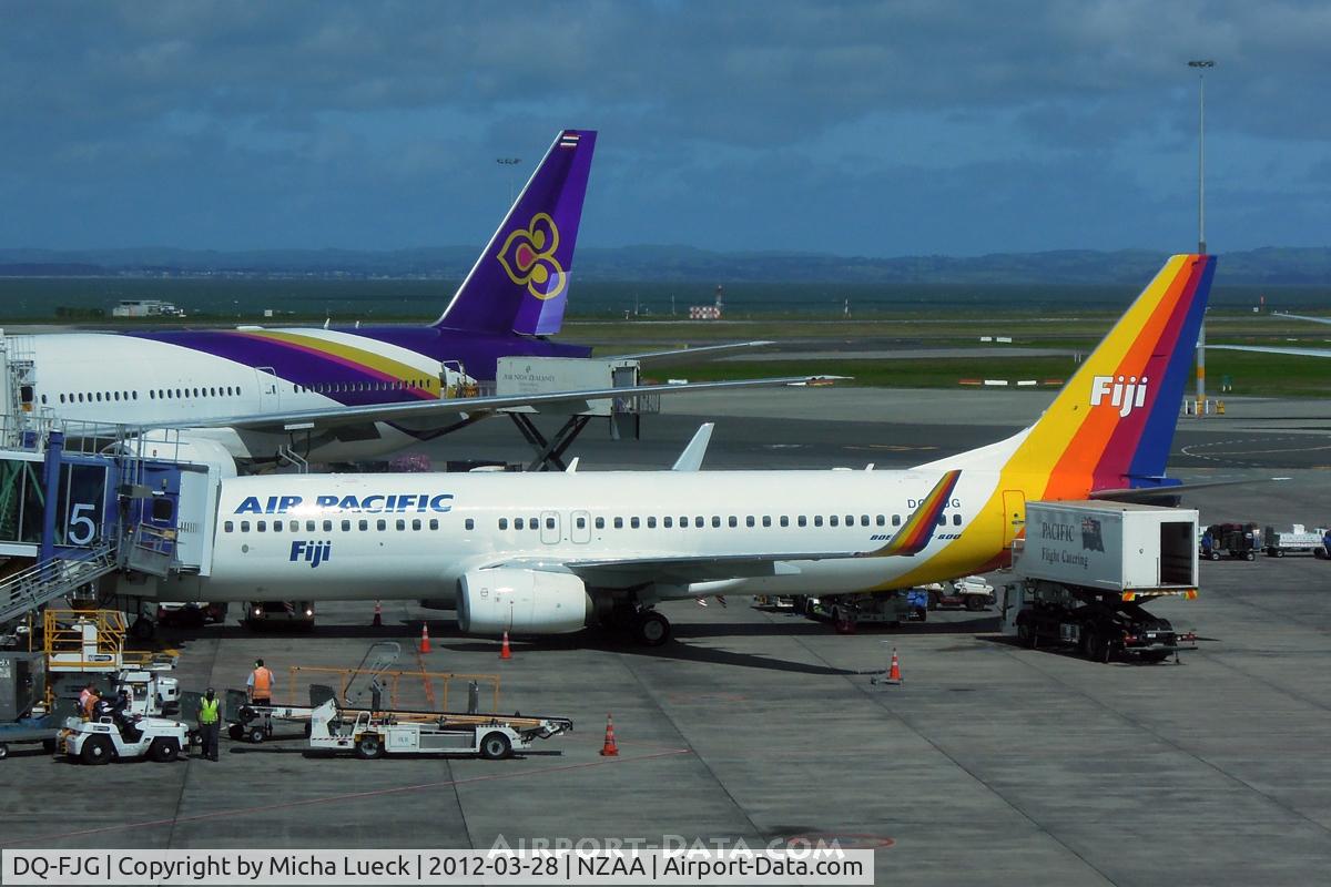 DQ-FJG, 1999 Boeing 737-8X2 C/N 29968, HS-TJT in the back