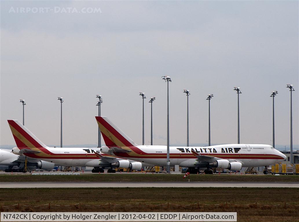 N742CK, 1990 Boeing 747-446 C/N 24424, Resting in family on new apron.....