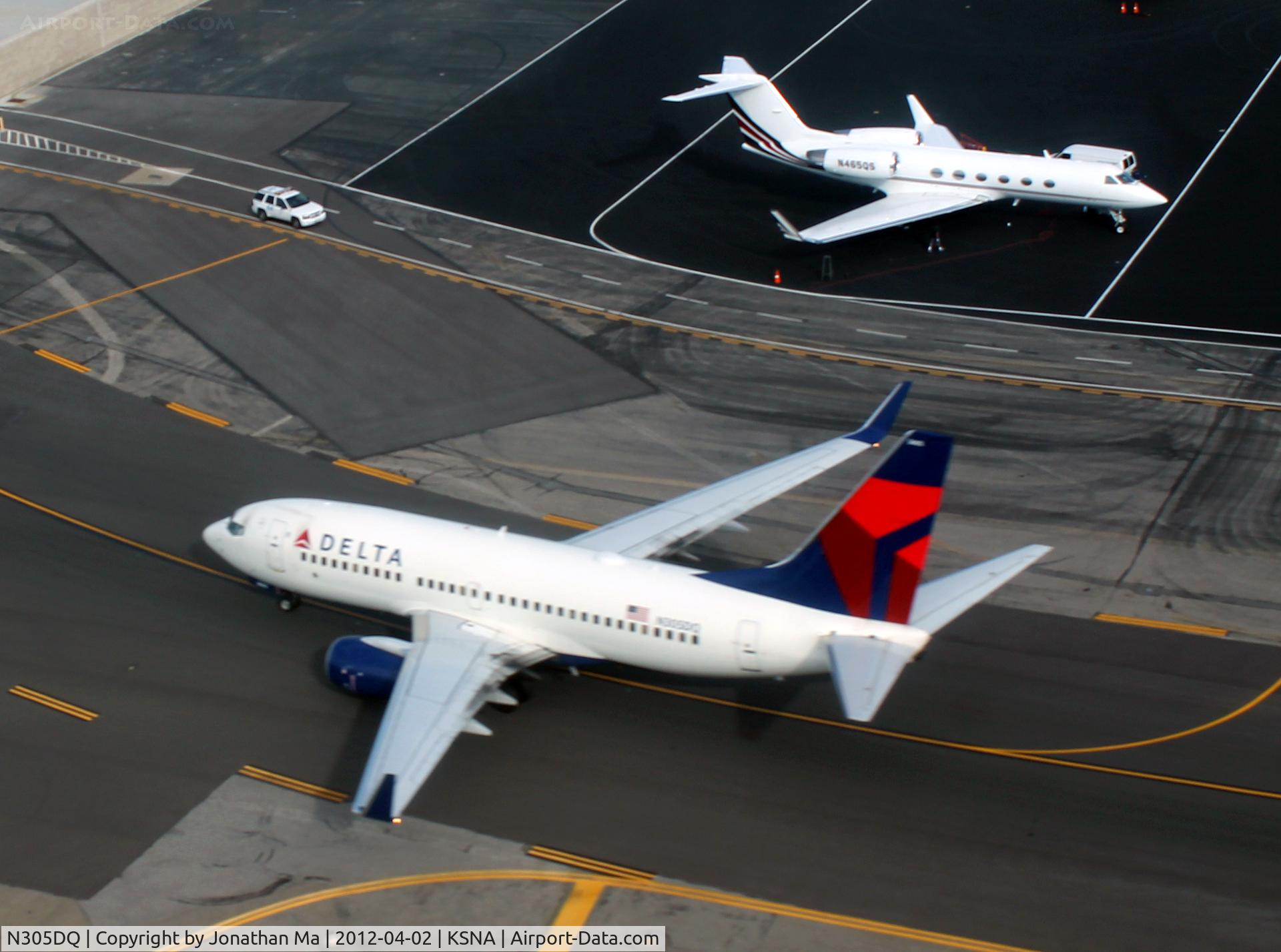 N305DQ, Boeing 737-732 C/N 29645, We had to go around after following this 737