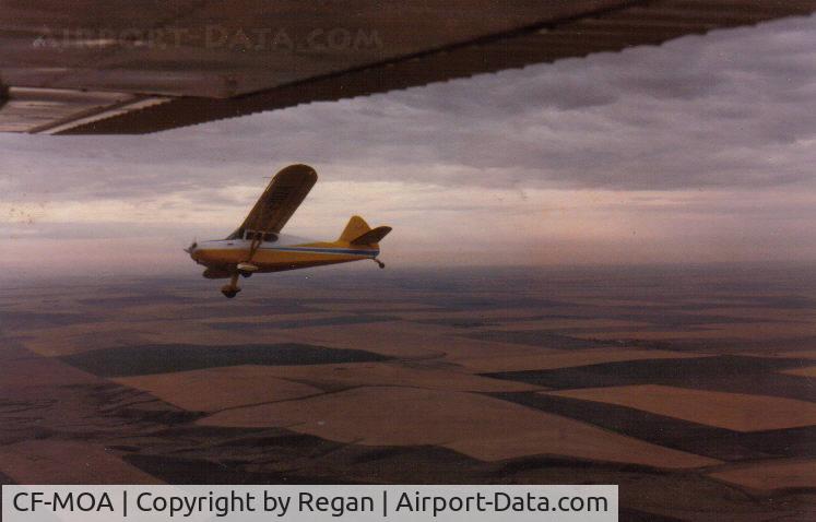 CF-MOA, 1947 Stinson 108-2 Voyager C/N 108-2281, In flight between Calgary and Red Deer 1982. Taken by Dave Jacques from his Cessna 140. Pre arranged photo op. as we passed him by (Chuckle!) 
