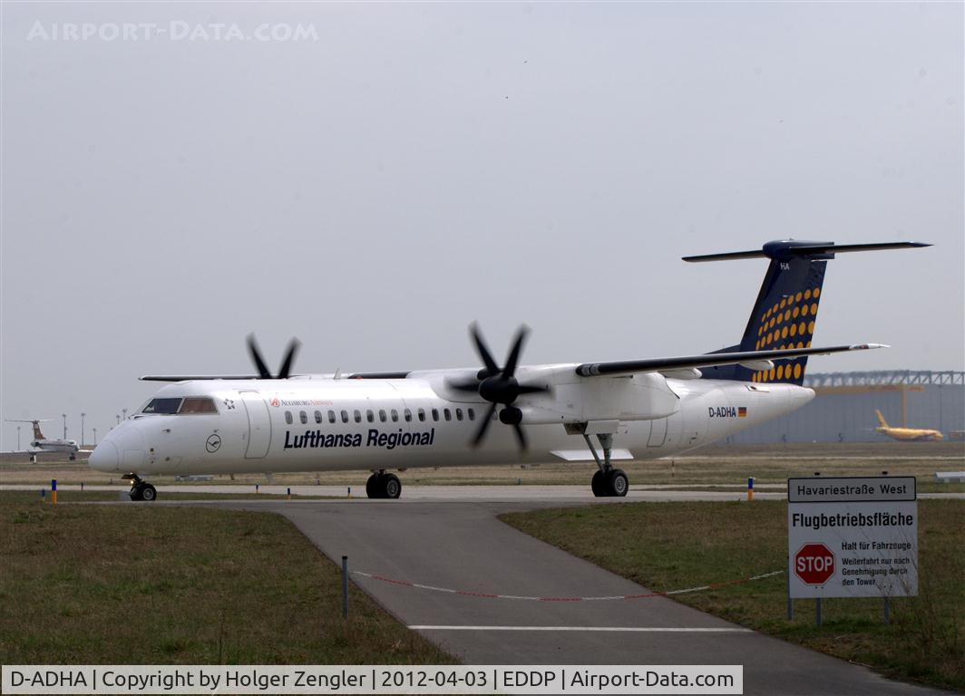 D-ADHA, 2000 De Havilland Canada DHC-8-402Q Dash 8 C/N 4028, Taxi to rwy 08L via W1 for a return to MUC....