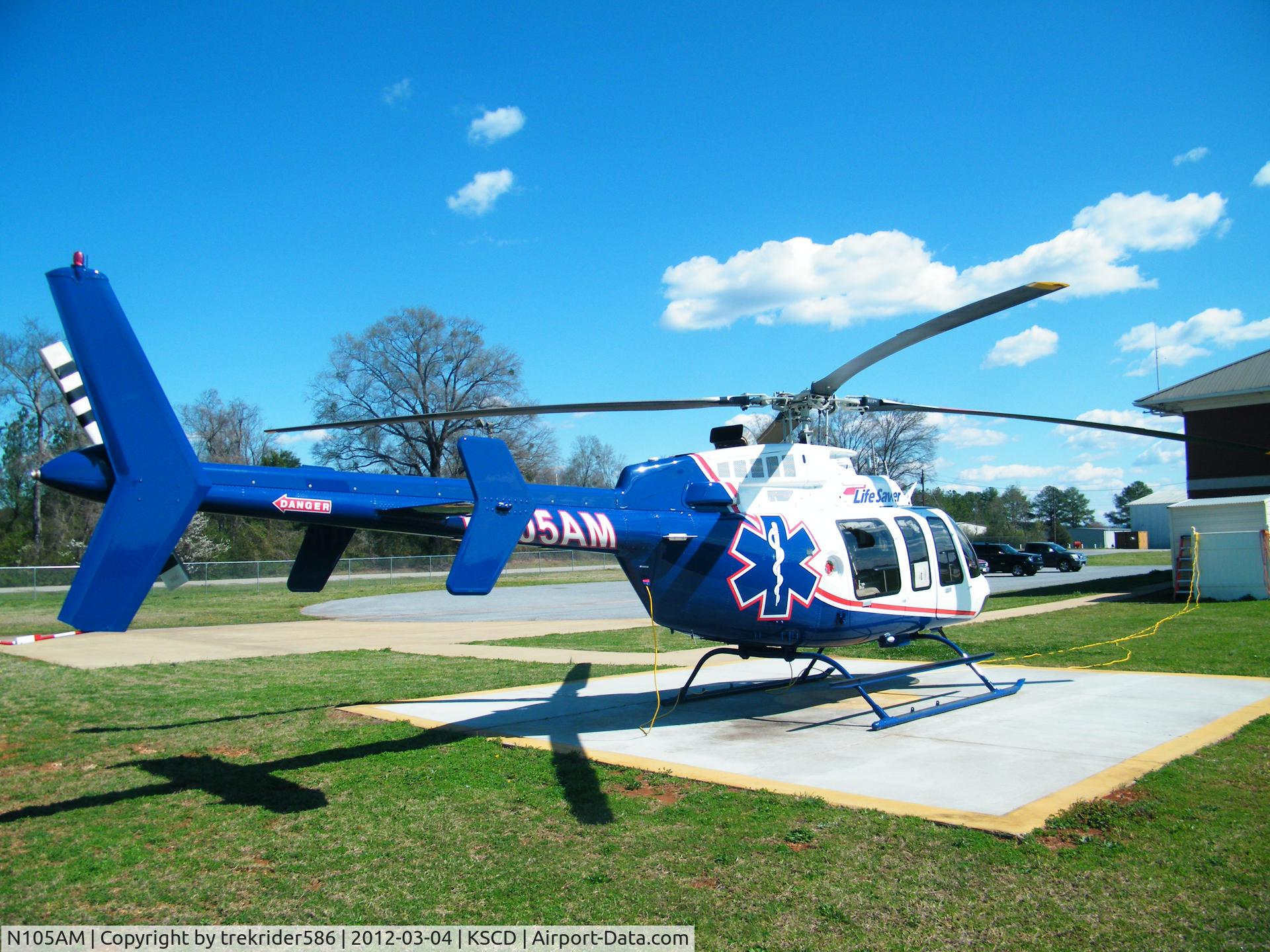 N105AM, 2010 Bell 407 C/N 54024, on station
