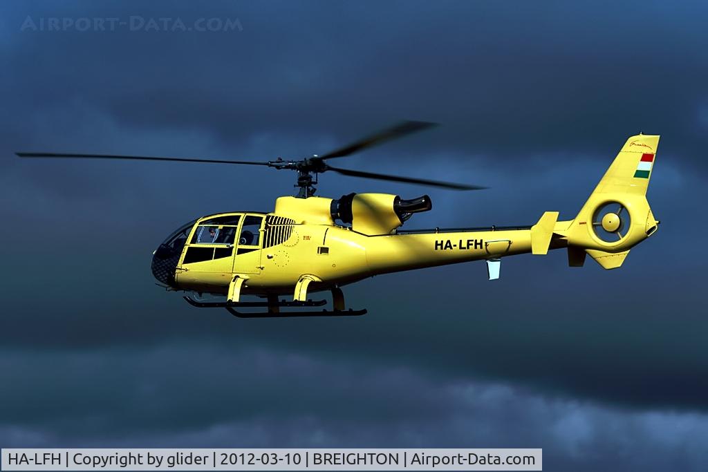 HA-LFH, 1979 Aerospatiale SA-342J Gazelle C/N 1775, Threatening skies