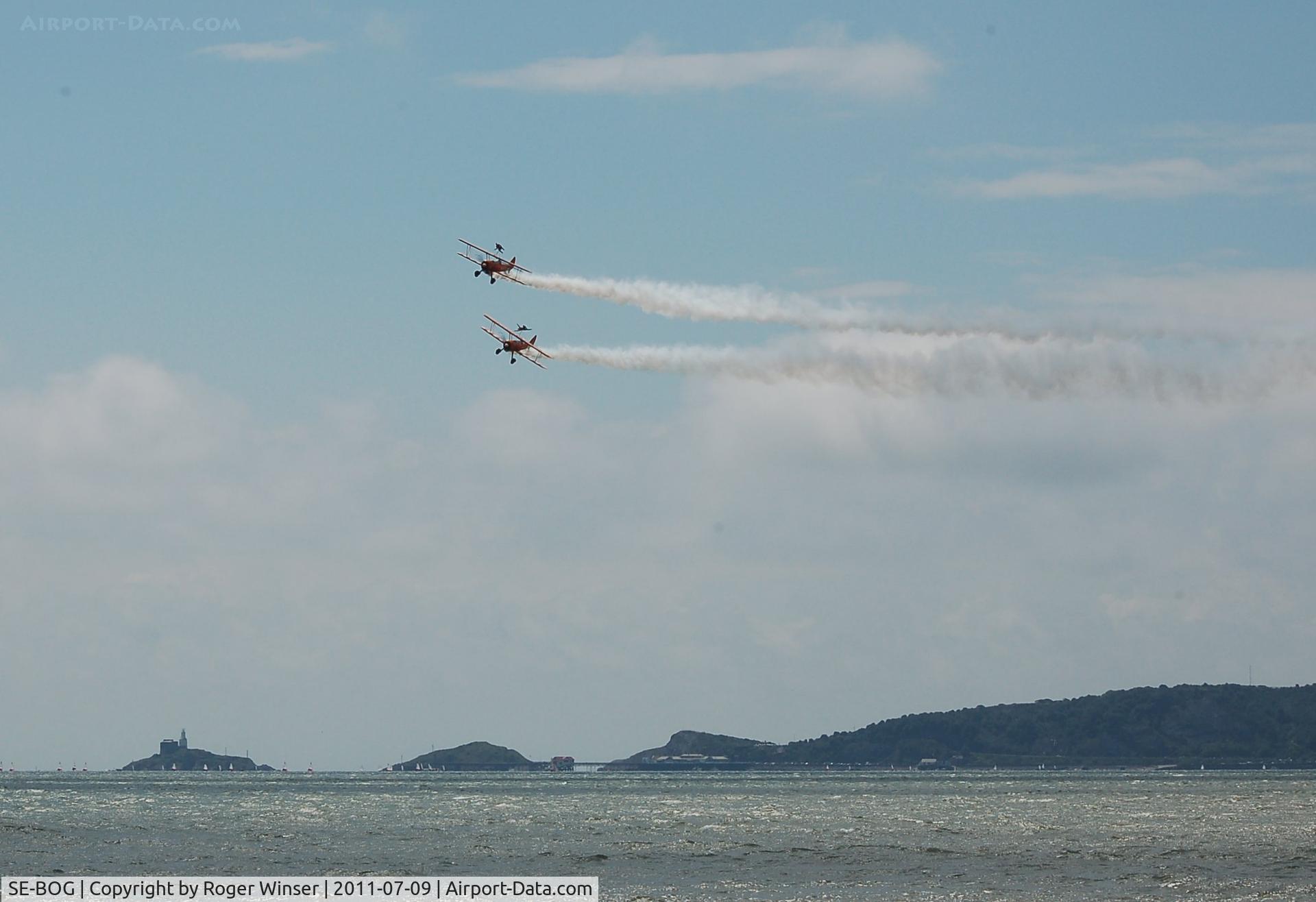 SE-BOG, 1942 Boeing N2S-3 Kaydet (B75N1) C/N 75-7128, Off airport. Breitling Wingwalkers. Displaying with N707TJ at the Wales National Airshow, Swansea Bay, Wales, UK.