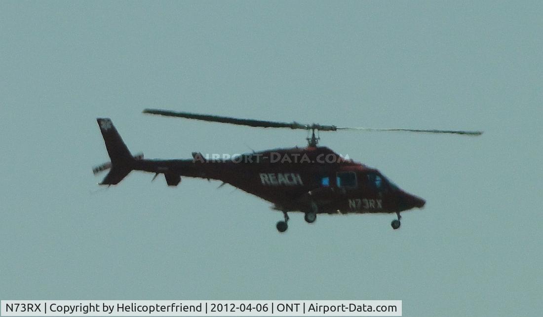 N73RX, 1980 Bell 222 C/N 47033, Reach helicopter shooting a landing for runway 26L