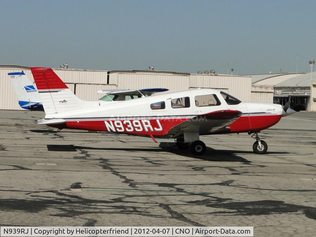 N939RJ, 1998 Piper PA-28-181 C/N 2843136, Parked south of the paint shop