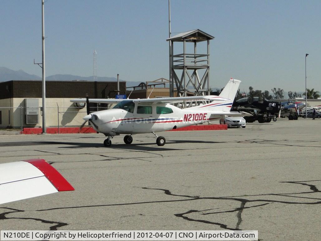 N210DE, 1972 Cessna T210L Turbo Centurion C/N 21059693, Taxiing past displayed aircraft