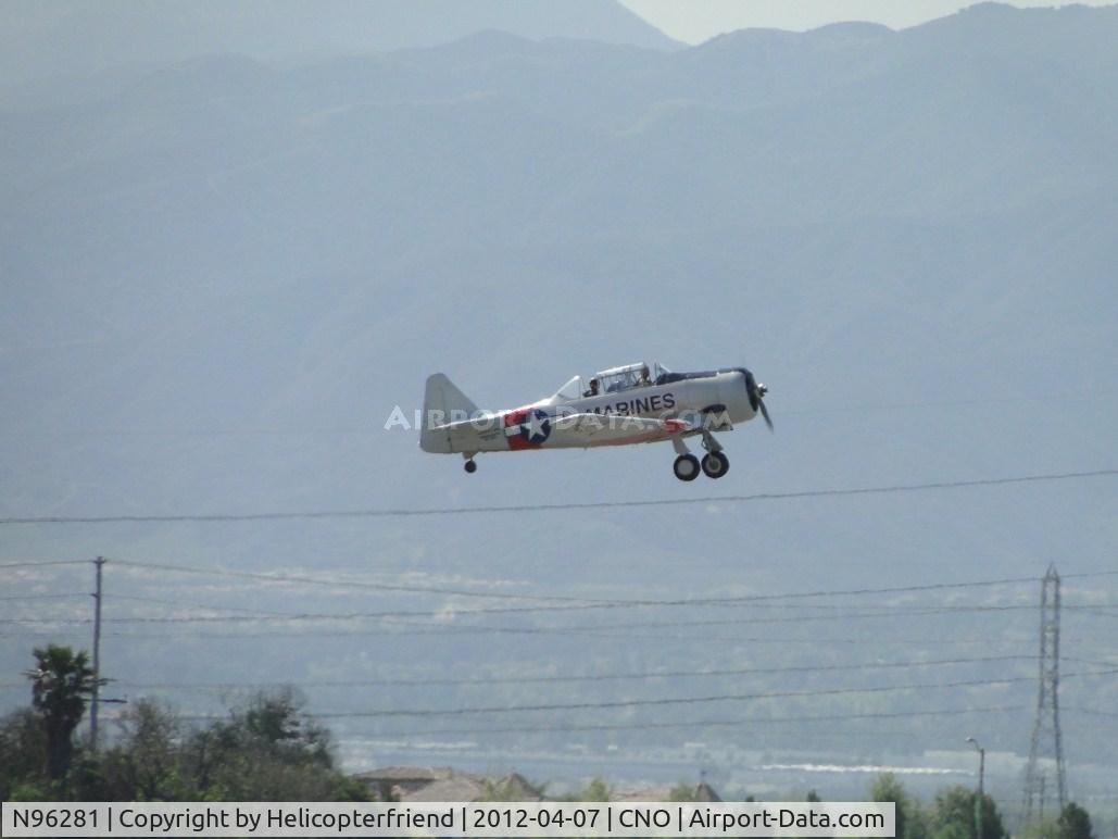 N96281, 1976 North American AT-6C Harvard IIA C/N 3832, Heading westbound after take off