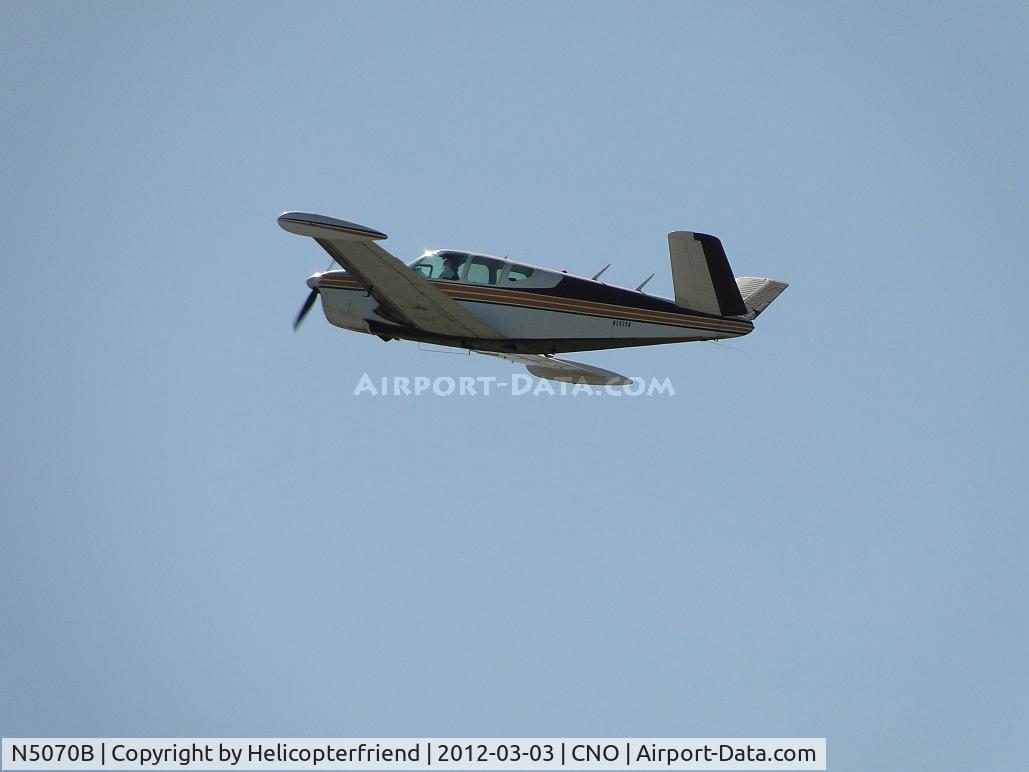 N5070B, 1955 Beech F35 Bonanza C/N D-4349, Eastbound on a windy day