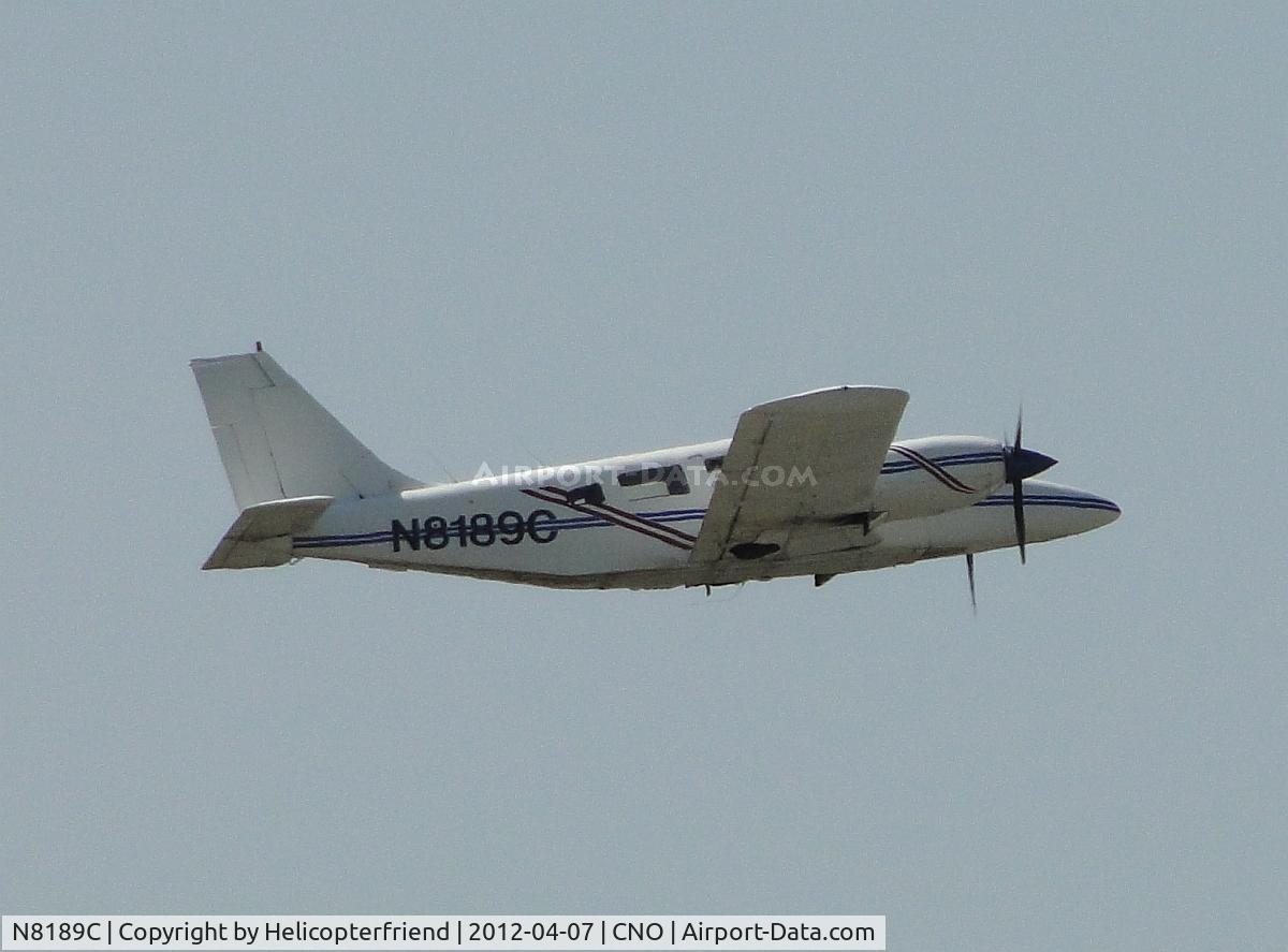 N8189C, 1980 Piper PA-34-200T Seneca C/N 34-8070184, Flying over runway 26R