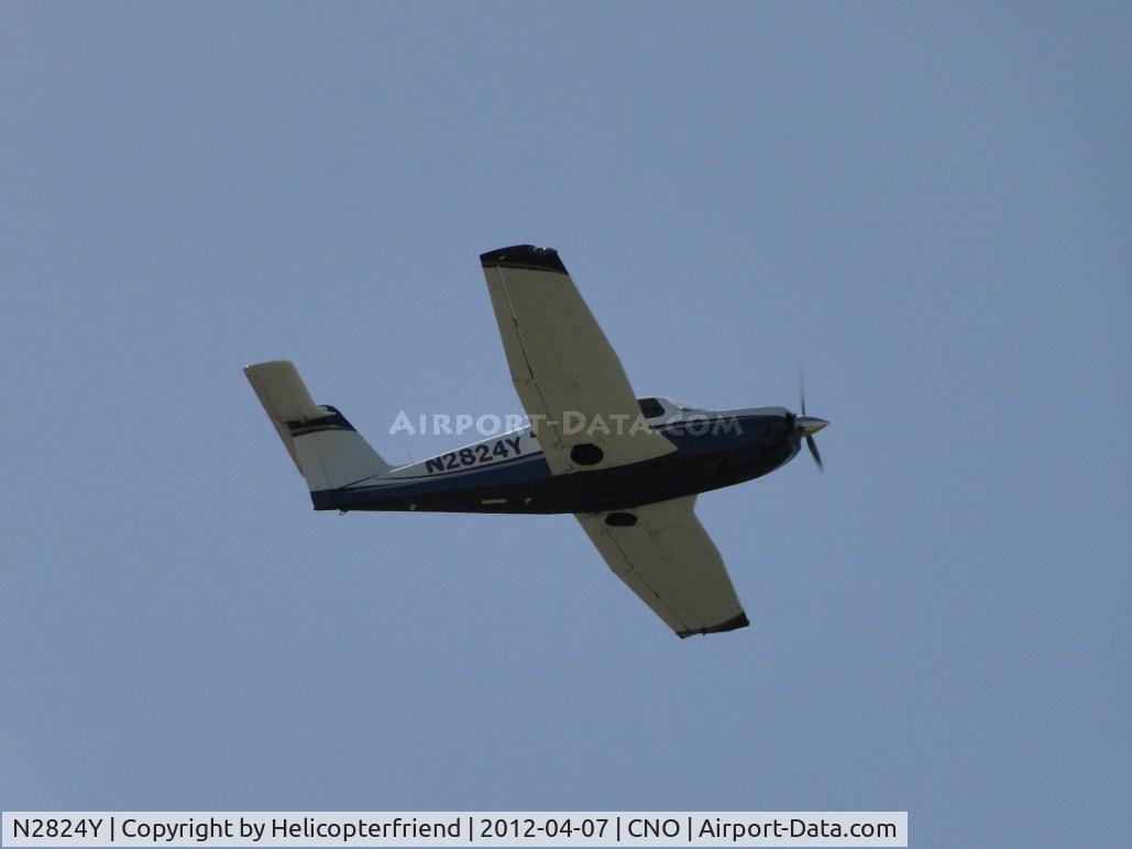 N2824Y, 1979 Piper PA-28RT-201 Arrow IV C/N 28R-7918161, Flying over runway 26R