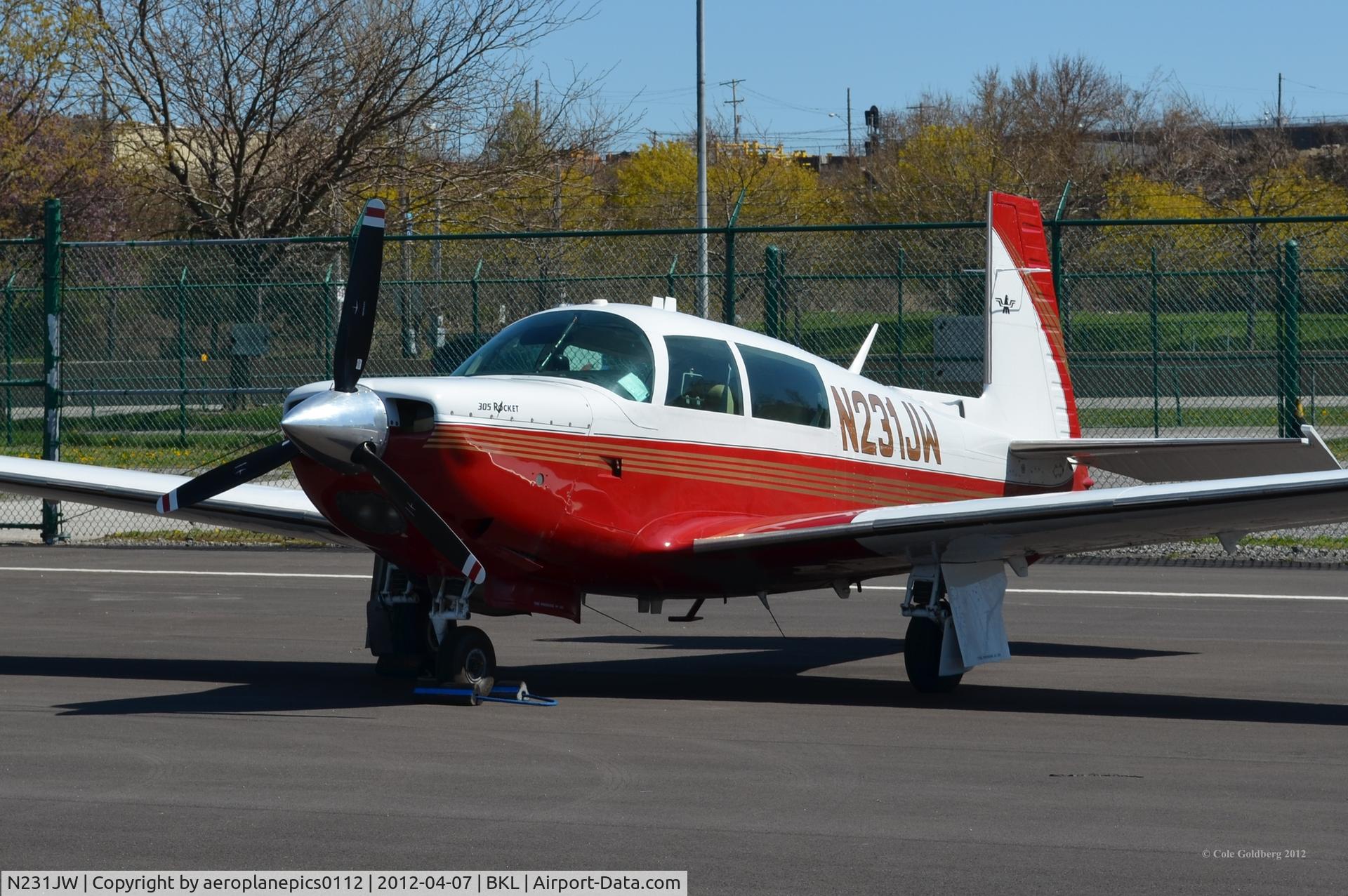 N231JW, 1979 Mooney M20K C/N 25-0031, N231JW seen at KBKL in red paint.