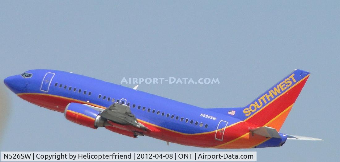 N526SW, 1992 Boeing 737-5H4 C/N 26568, Airbourne from 26R, wheels retracted and heading west