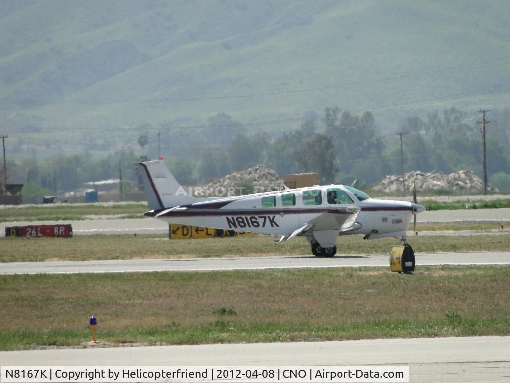 N8167K, 1993 Beech B36TC Turbo Bonanza C/N EA-547, Rolling out after landing on 26R