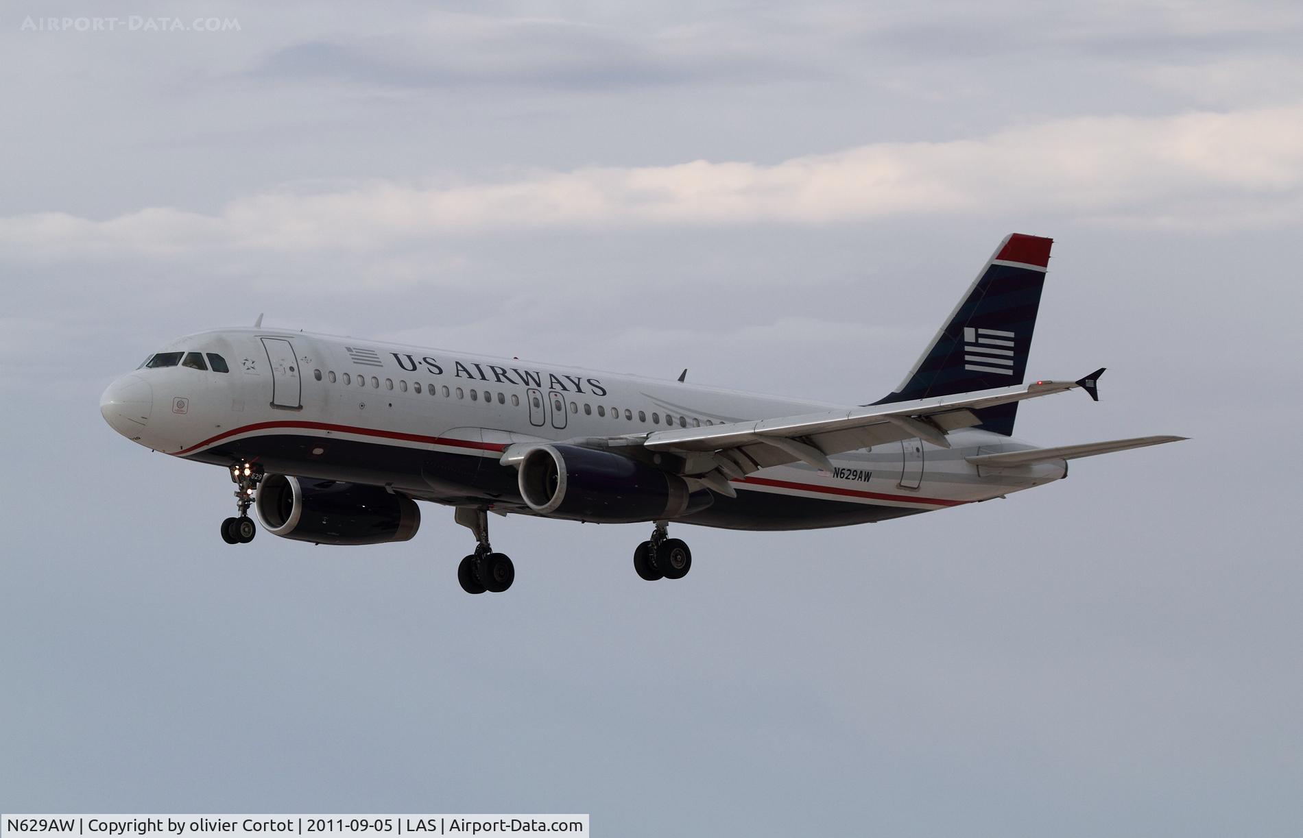 N629AW, 1990 Airbus A320-231 C/N 076, Cloudy las Vegas...