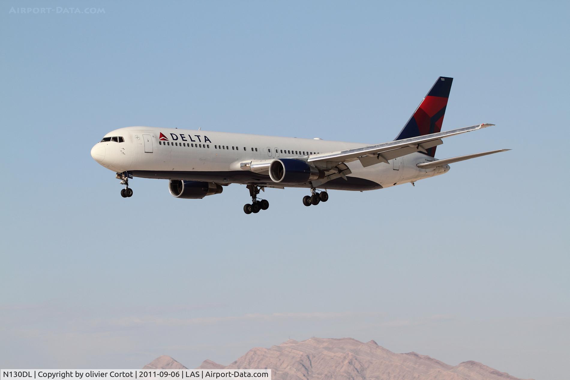N130DL, 1988 Boeing 767-332 C/N 24080, 767 over nevada's moutains