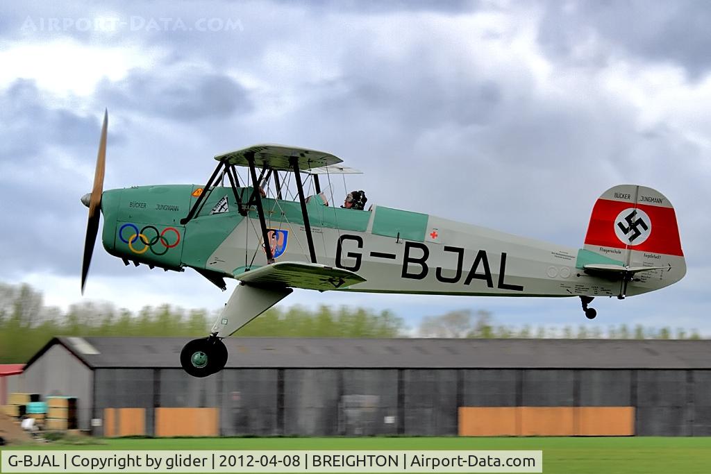 G-BJAL, 1957 Bucker 1-131E Jungmann C/N 1028, Trademark low level flypast