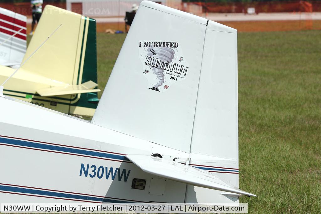 N30WW, 1994 Thorp T-18 Tiger C/N 1 (N30WW), 1994 Williams William F THORP S-18, c/n: 1 at 2012 Sun N Fun with tail logo to prove he survived the tornado at the 2011 event