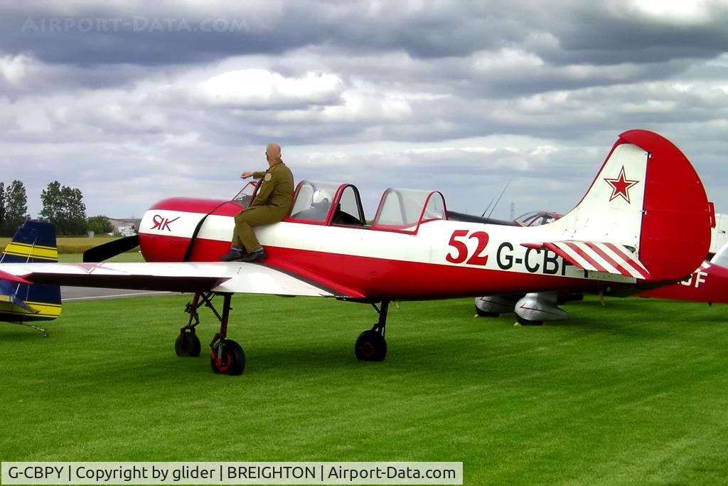 G-CBPY, 1980 Bacau Yak-52 C/N 800708, Aerobatic competition entrant awaiting his turn!