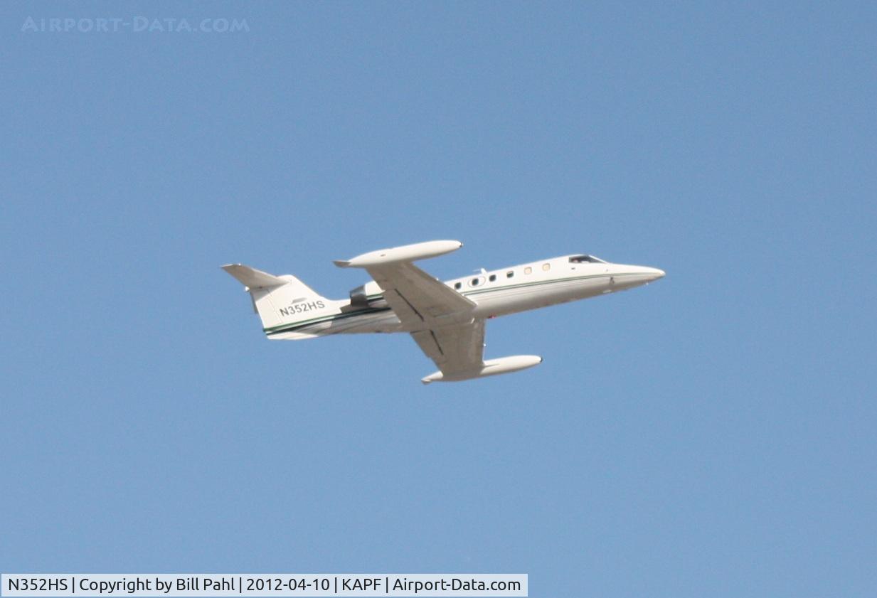 N352HS, Gates Learjet 35A C/N 596, Shortly after takeoff from Naples Municipal