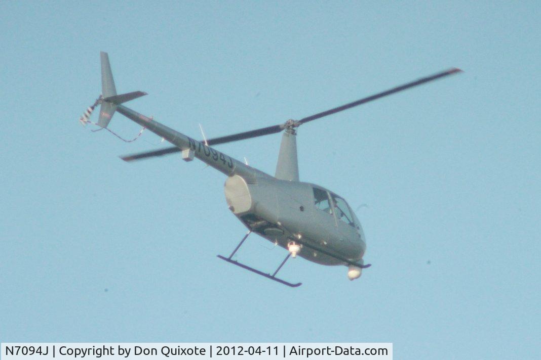 N7094J, 1999 Robinson R44 C/N 0600, Canon Rebel T3 with Leicaflex 400mm and two 2x teleconvertors.  Hovering over 595 and 441 in Broward County Florida.    Wonder what they were doin' ?
