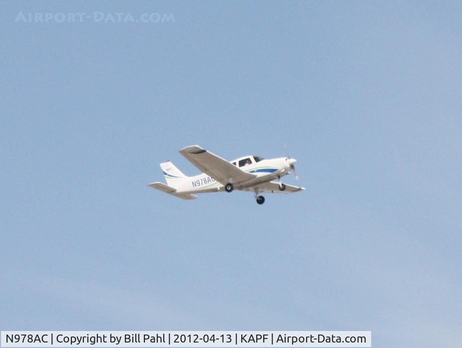 N978AC, 1989 Piper PA-28-161 Cherokee Warrior II C/N 2841220, Shortly after takeoff from Naples Municipal