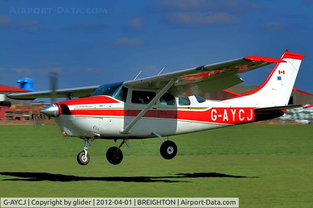 G-AYCJ, 1968 Cessna TP206D Turbo Super Skylane C/N T206-0552, Canadian flag on the tail!