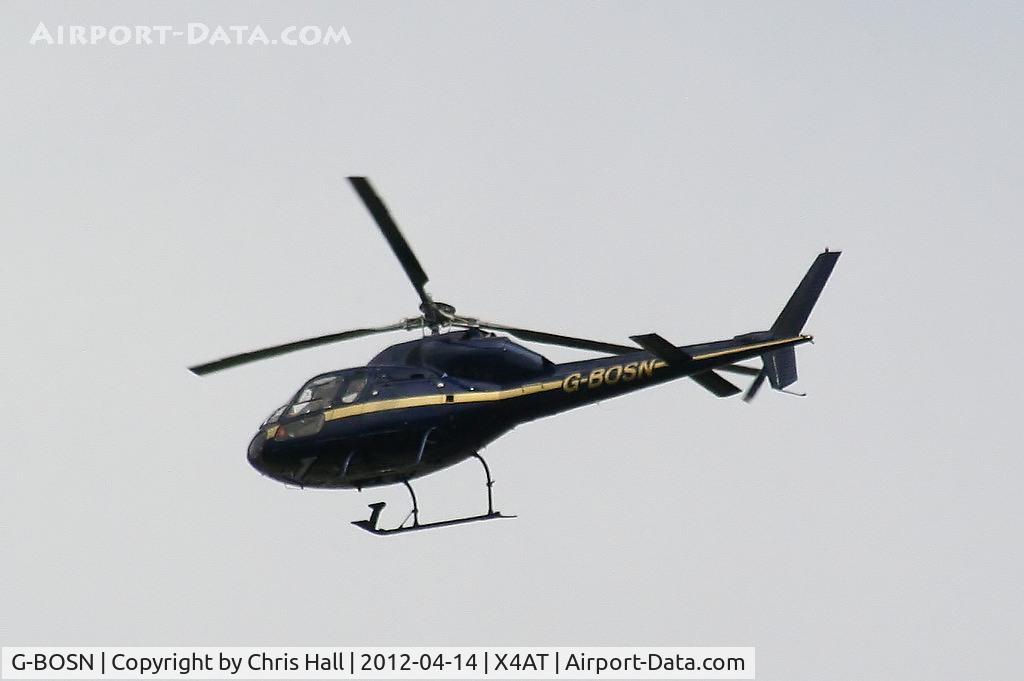 G-BOSN, 1982 Aerospatiale AS-355F-1 Ecureuil 2 C/N 5266, Ferrying racegoers into Aintree for the 2012 Grand National