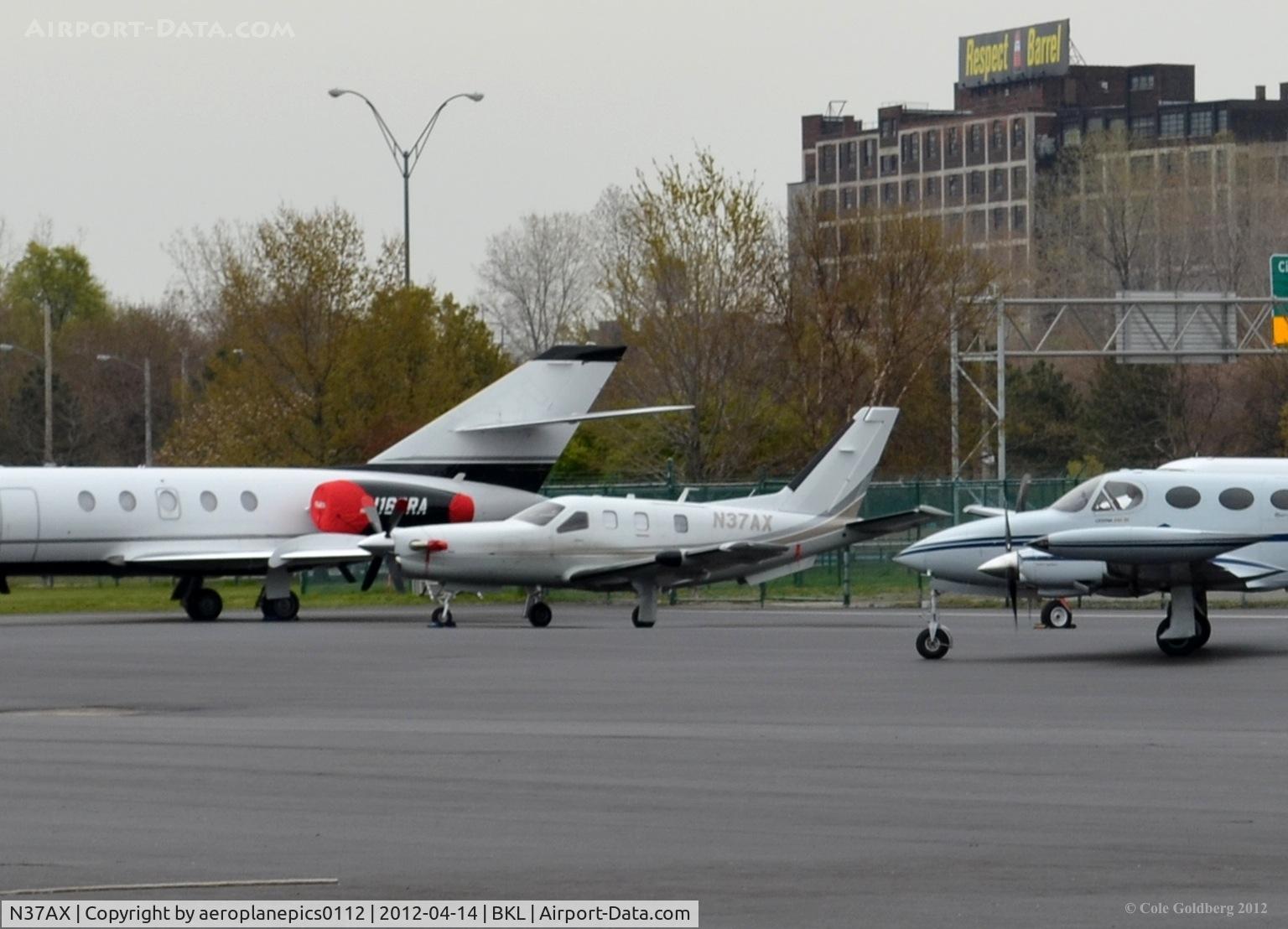 N37AX, Socata TBM-700 C/N 607, N37AX seen on a rainy day in Cleveland at KBKL.