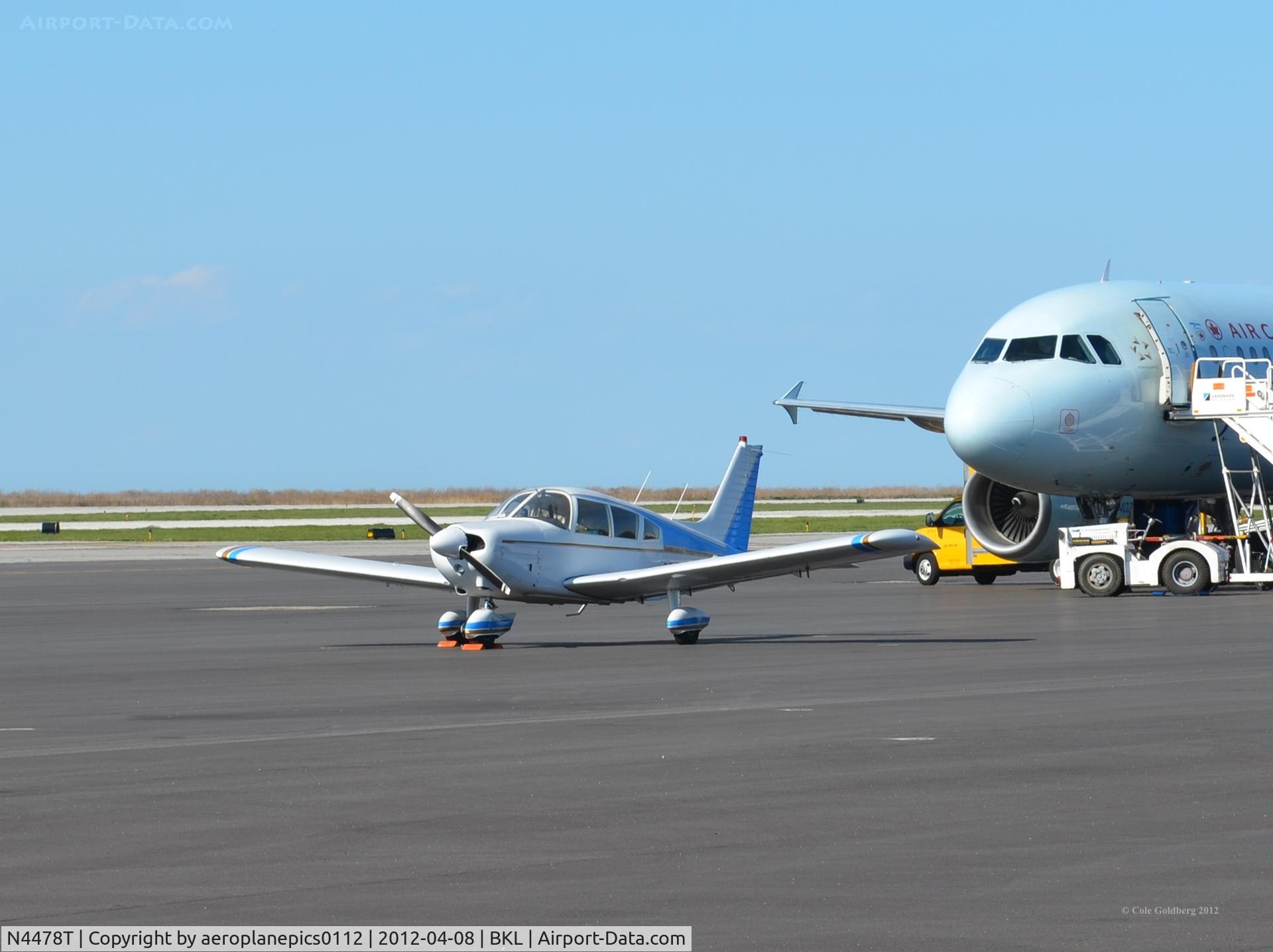N4478T, 1972 Piper PA-28-180 C/N 28-7205168, N4478T seen parked in front of the Blue Jays' charter plane, Air Canada's C-FPWE.