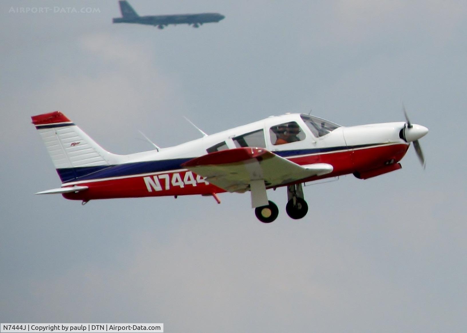 N7444J, 1968 Piper PA-28R-180 Cherokee Arrow C/N 28R-30791, Off of Rwy 14 at Downtown Shreveport with a B-52H on final for Rwy 15 for Barksdale Air Force Base in the distance.