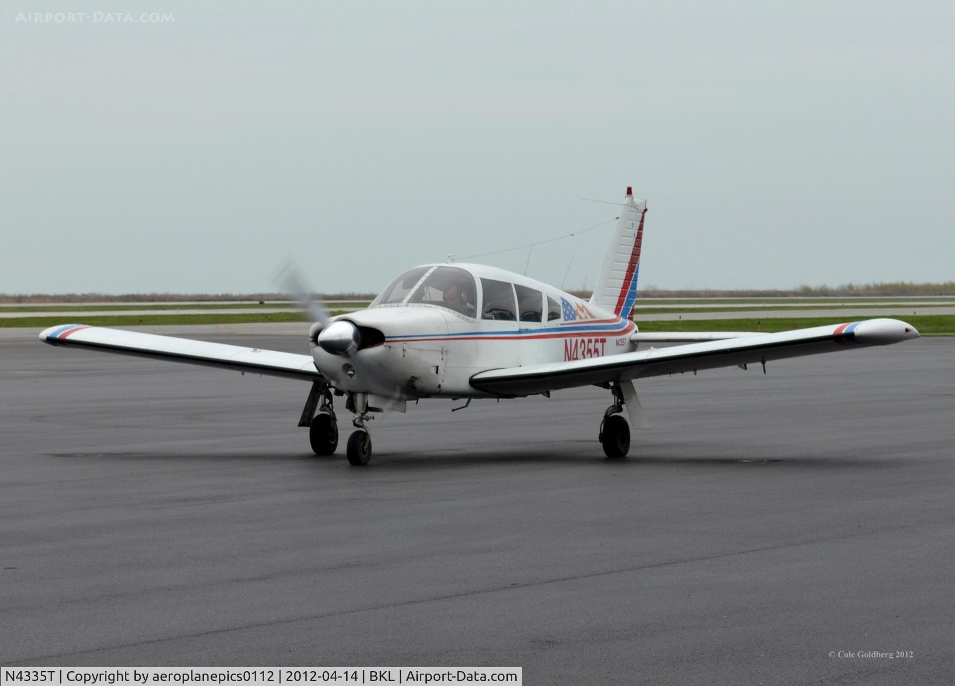 N4335T, 1971 Piper PA-28-140 C/N 28-7225149, N4335T seen on a rainy day In Cleveland at Burke Lakefront International Airport.