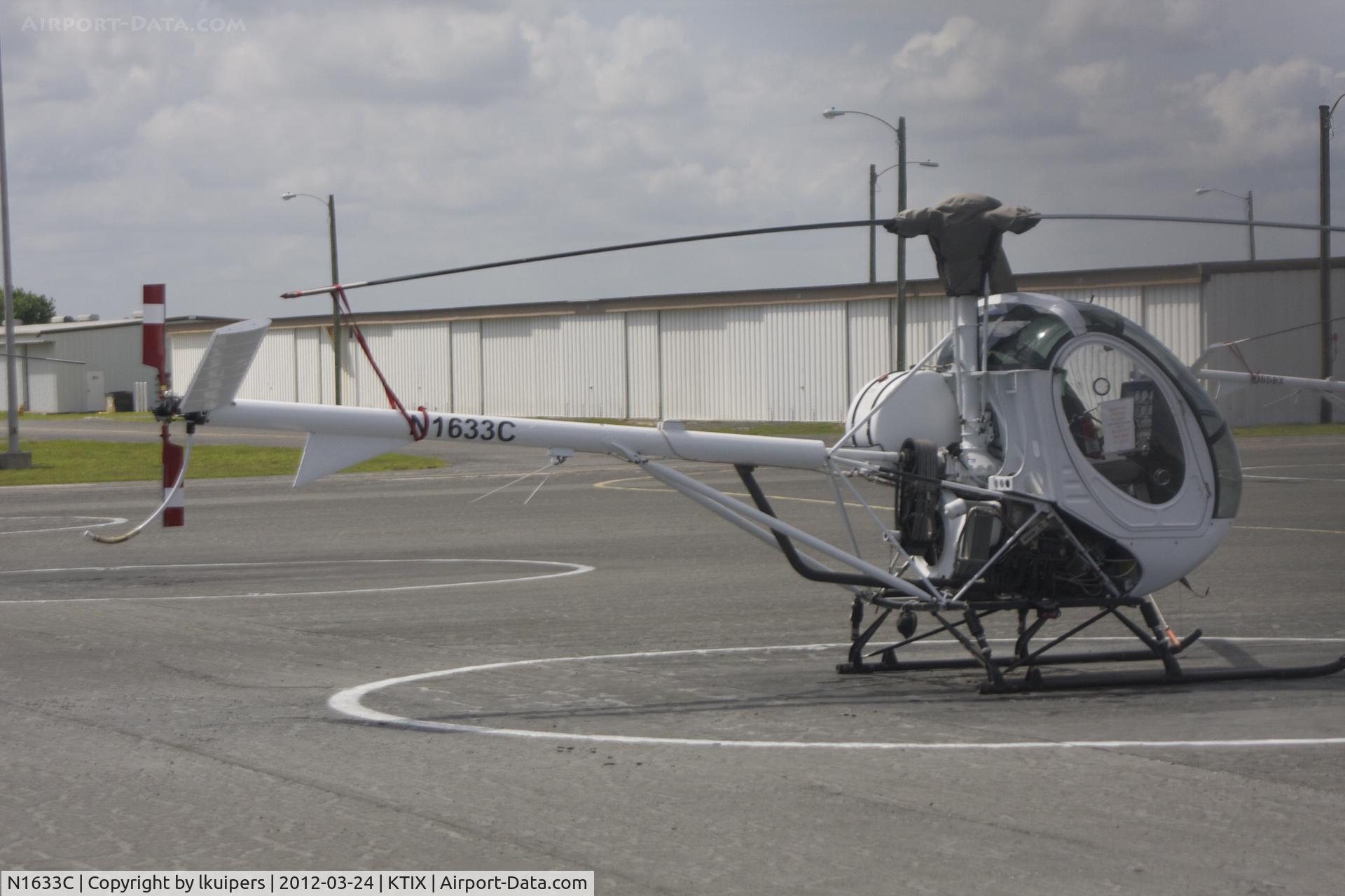 N1633C, 2005 Schweizer 269C-1 C/N 0208, At Titusville you can see a large number of these small helicopters.