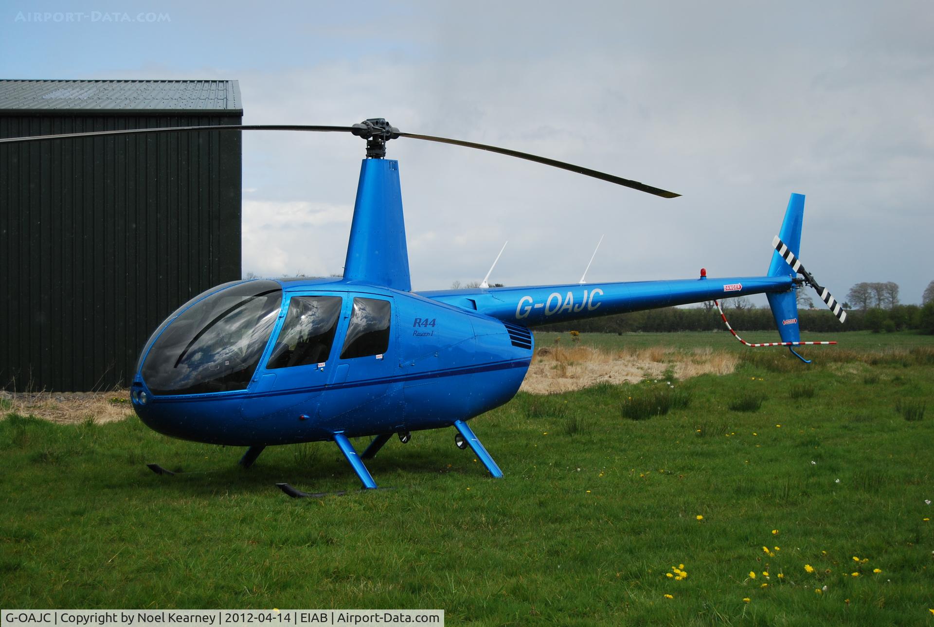 G-OAJC, 2004 Robinson R44 Raven I C/N 1381, Parked on the grass at Abbeyshrule airfield.