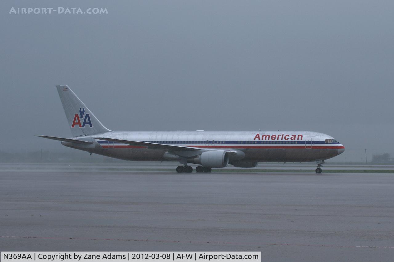 N369AA, 1992 Boeing 767-323 C/N 25196, American Airlines 767 diverted to Alliance Airport during heavy rains.