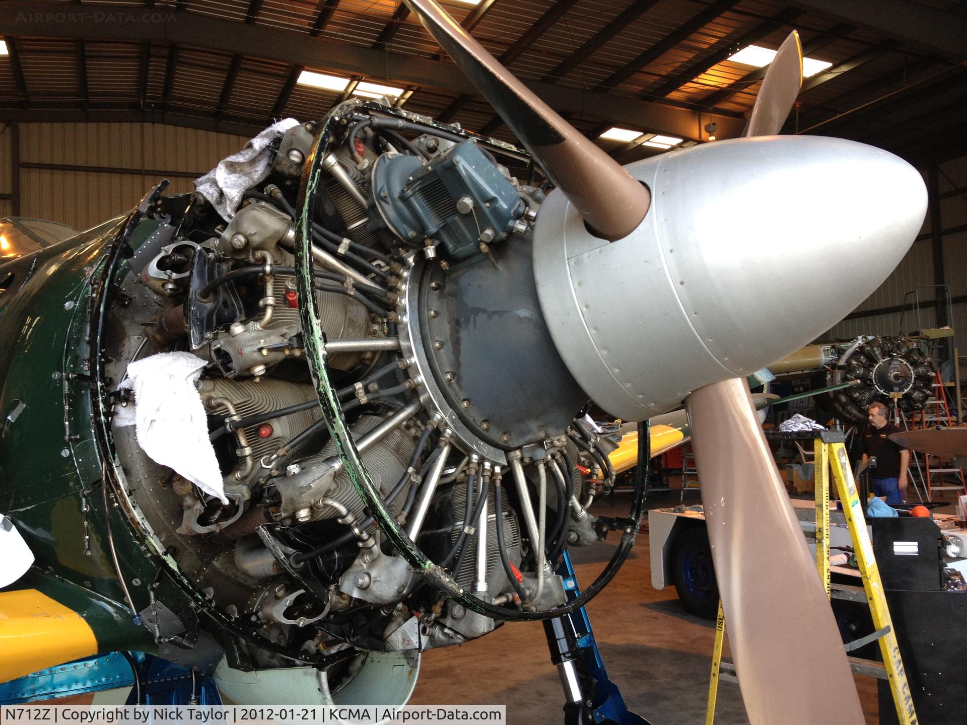 N712Z, 1942 Mitsubishi A6M3 Reisen (Zero) C/N 3869, Zero undergoing maintenance