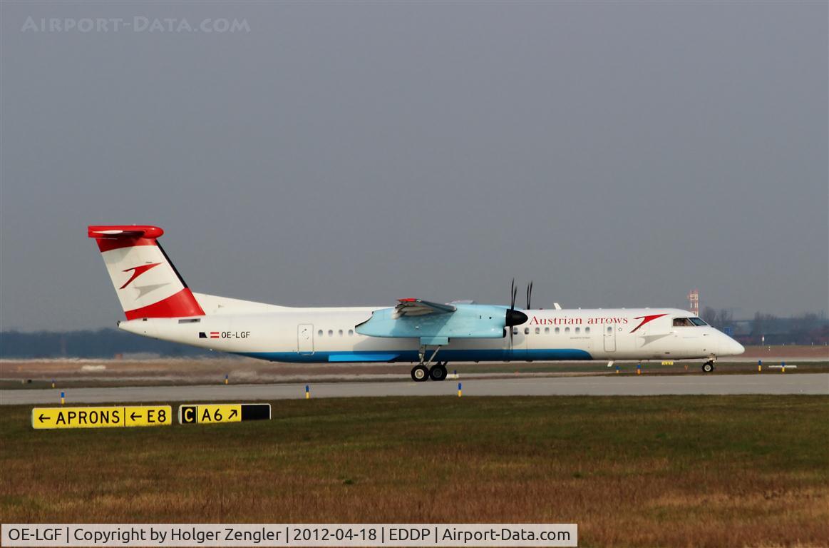 OE-LGF, 2002 De Havilland Canada DHC-8-402Q Dash 8 C/N 4068, First in first out: Vienna shuttle on taxi via E6 to rwy 26R.
