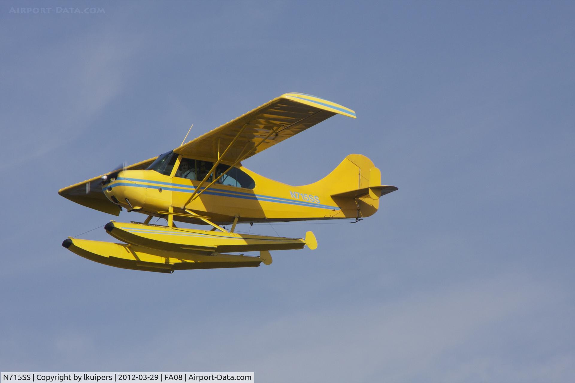 N715SS, 1956 Champion 7EC C/N 7EC380, During a pass over Lake Agnes en route to the FlyBy at Sun' n Fun