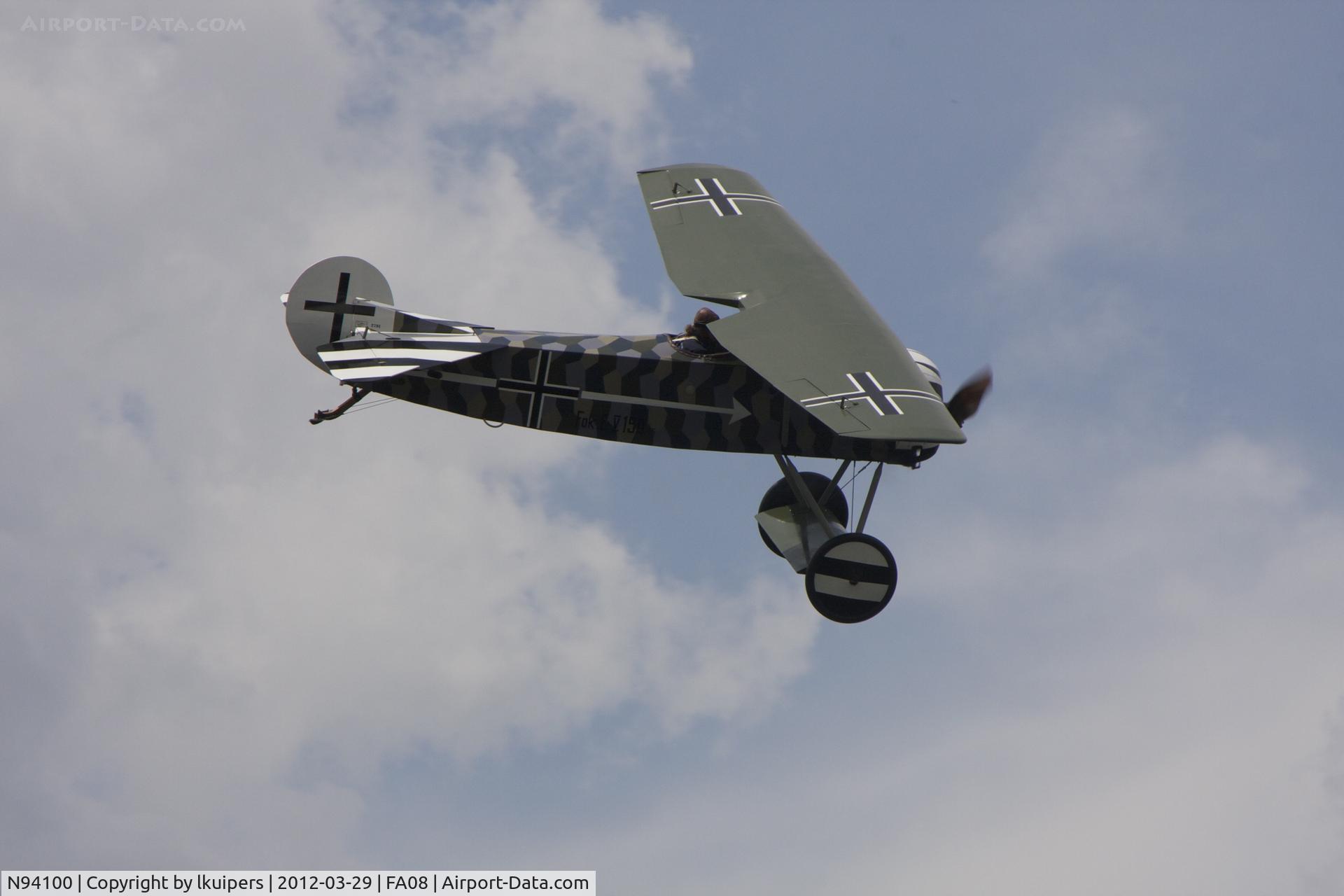 N94100, 1994 Fokker D-8 Replica C/N 941, During an airshow above Lake Agnes during the Splash in