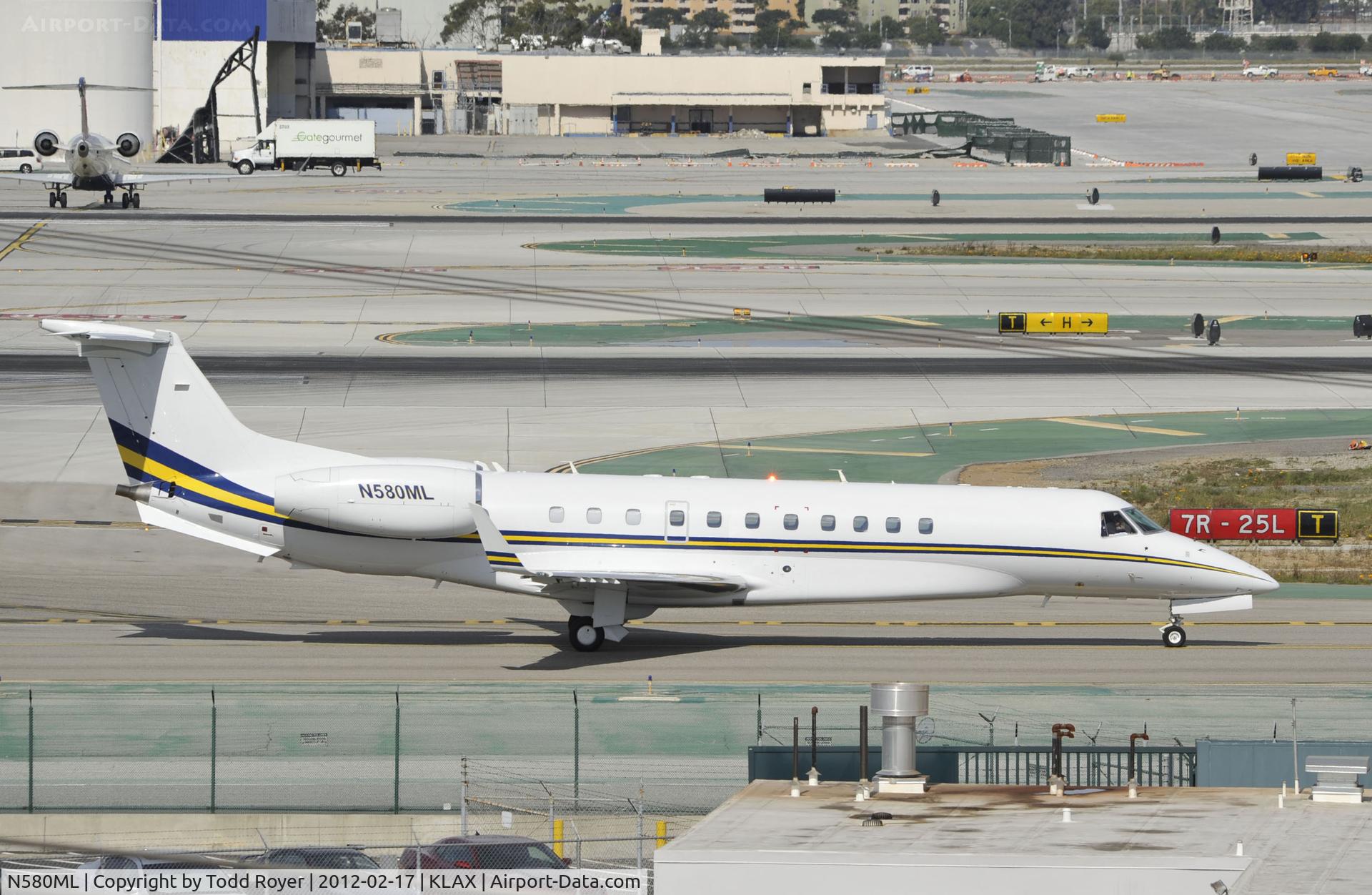 N580ML, 2007 Embraer EMB-135BJ Legacy C/N 14500990, Taxiing to parking at LAX