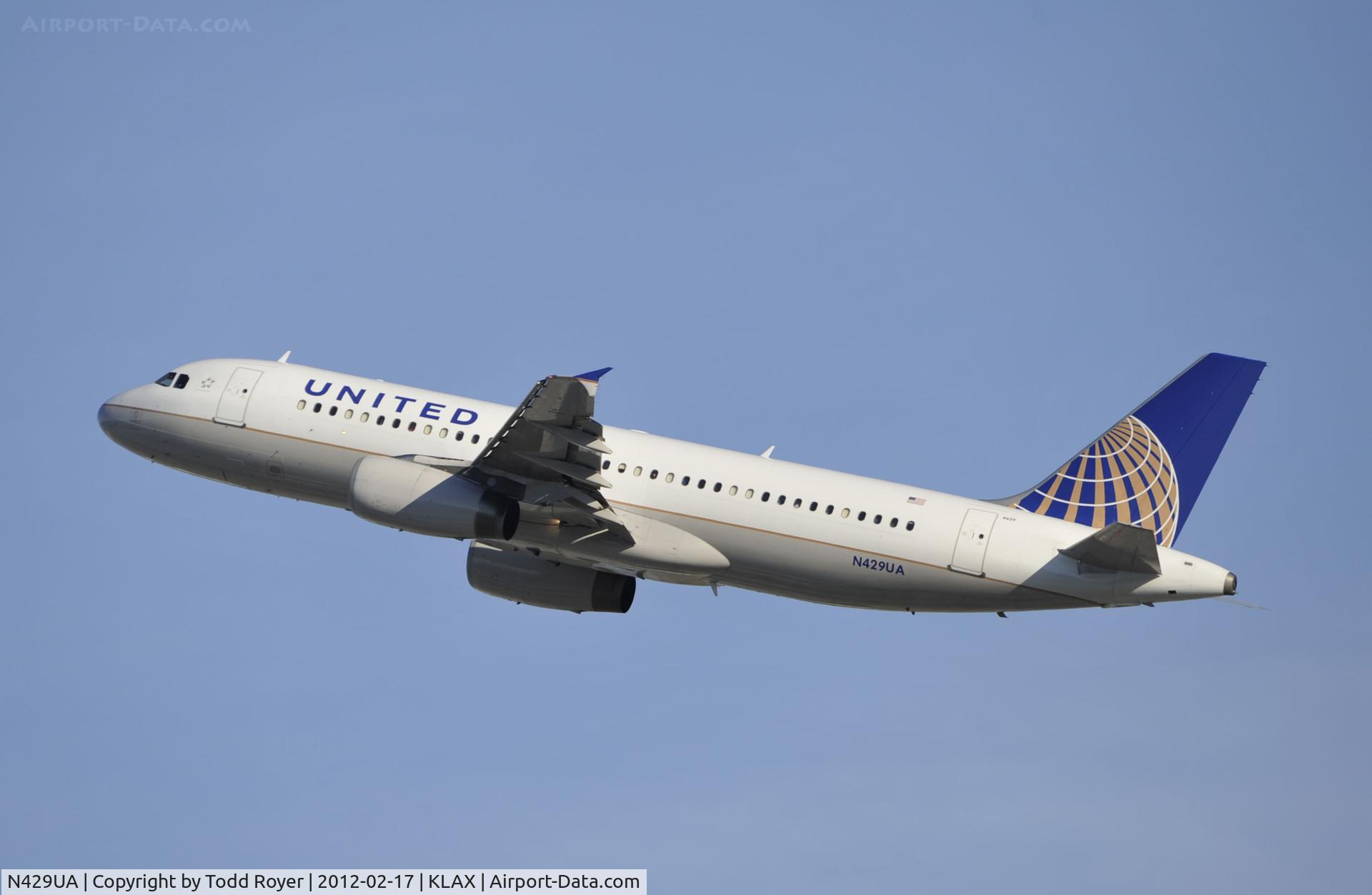 N429UA, 1995 Airbus A320-232 C/N 539, Departing LAX on 25R