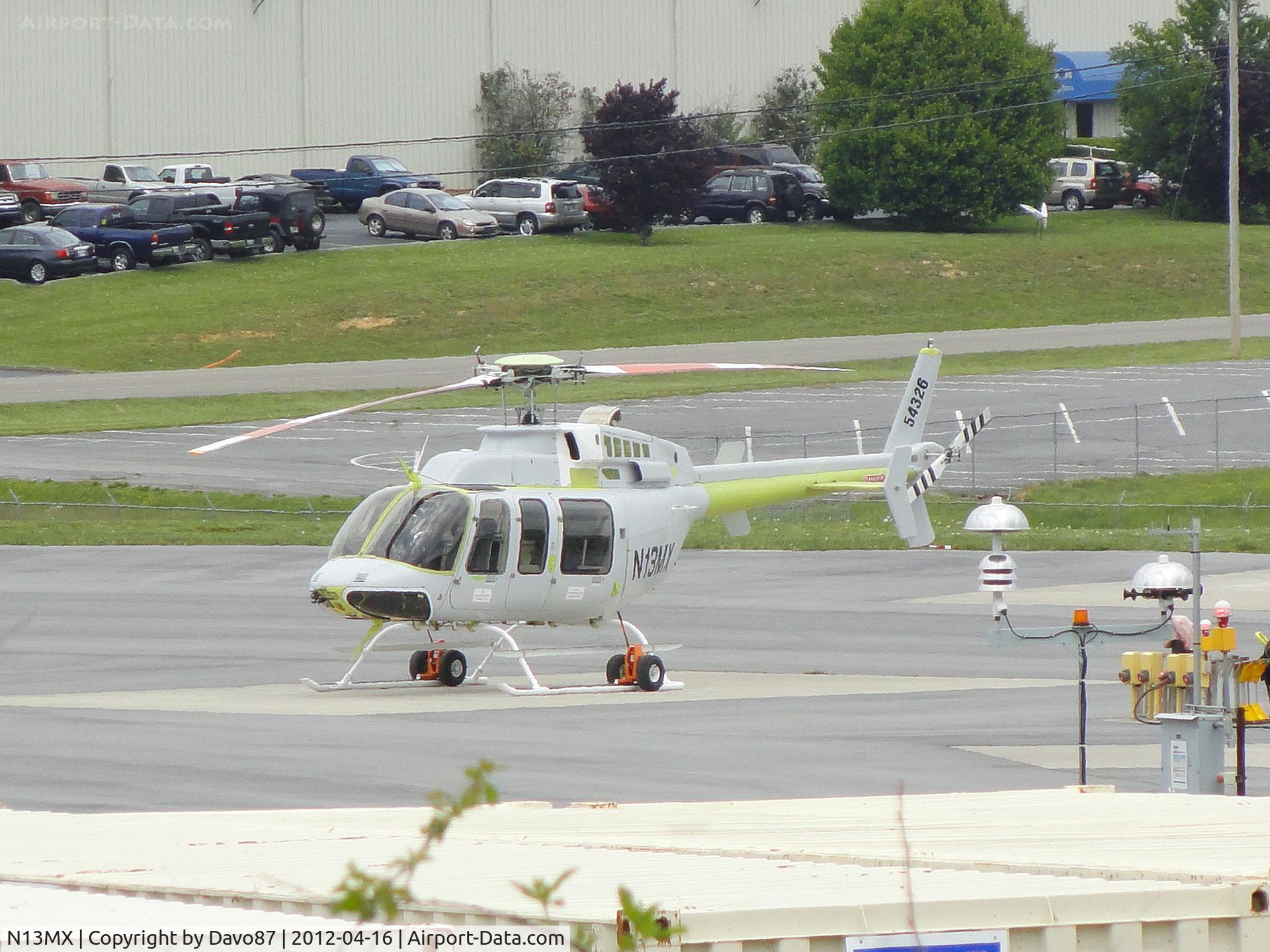 N13MX, 2012 Bell 407 C/N 54326, Under maintenance at the Bell Helicopter facility in Piney Flats, TN
