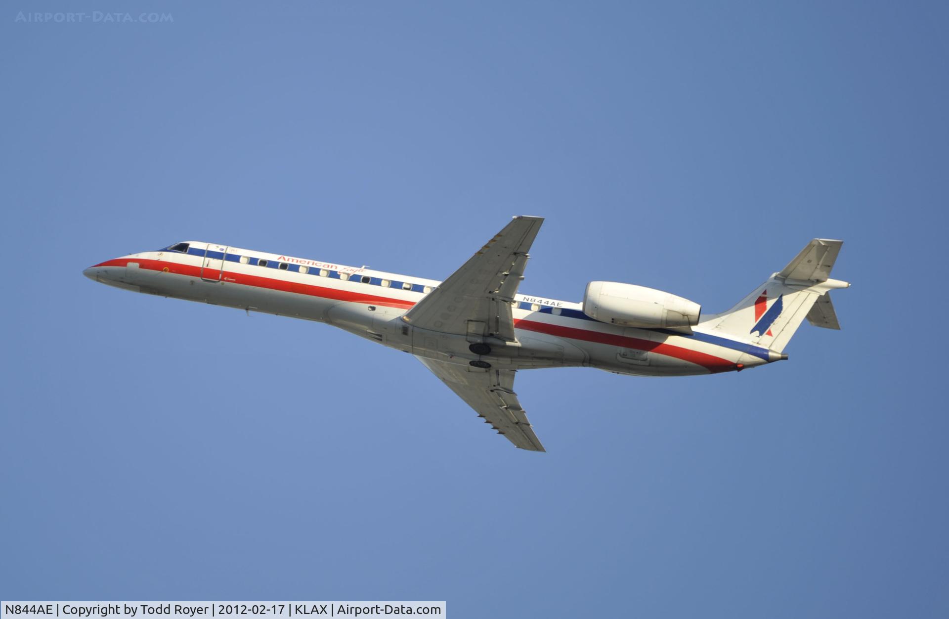 N844AE, 2003 Embraer ERJ-140LR (EMB-135KL) C/N 145682, Departing LAX on 25R