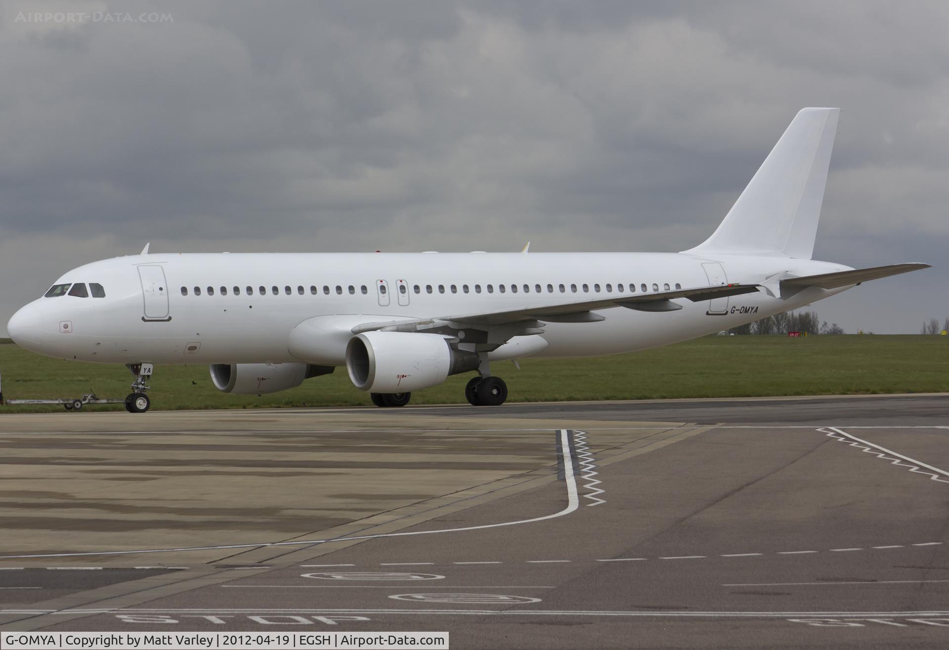 G-OMYA, 1997 Airbus A320-214 C/N 716, Being towed to stand 8 after spray in to an all white C/S.