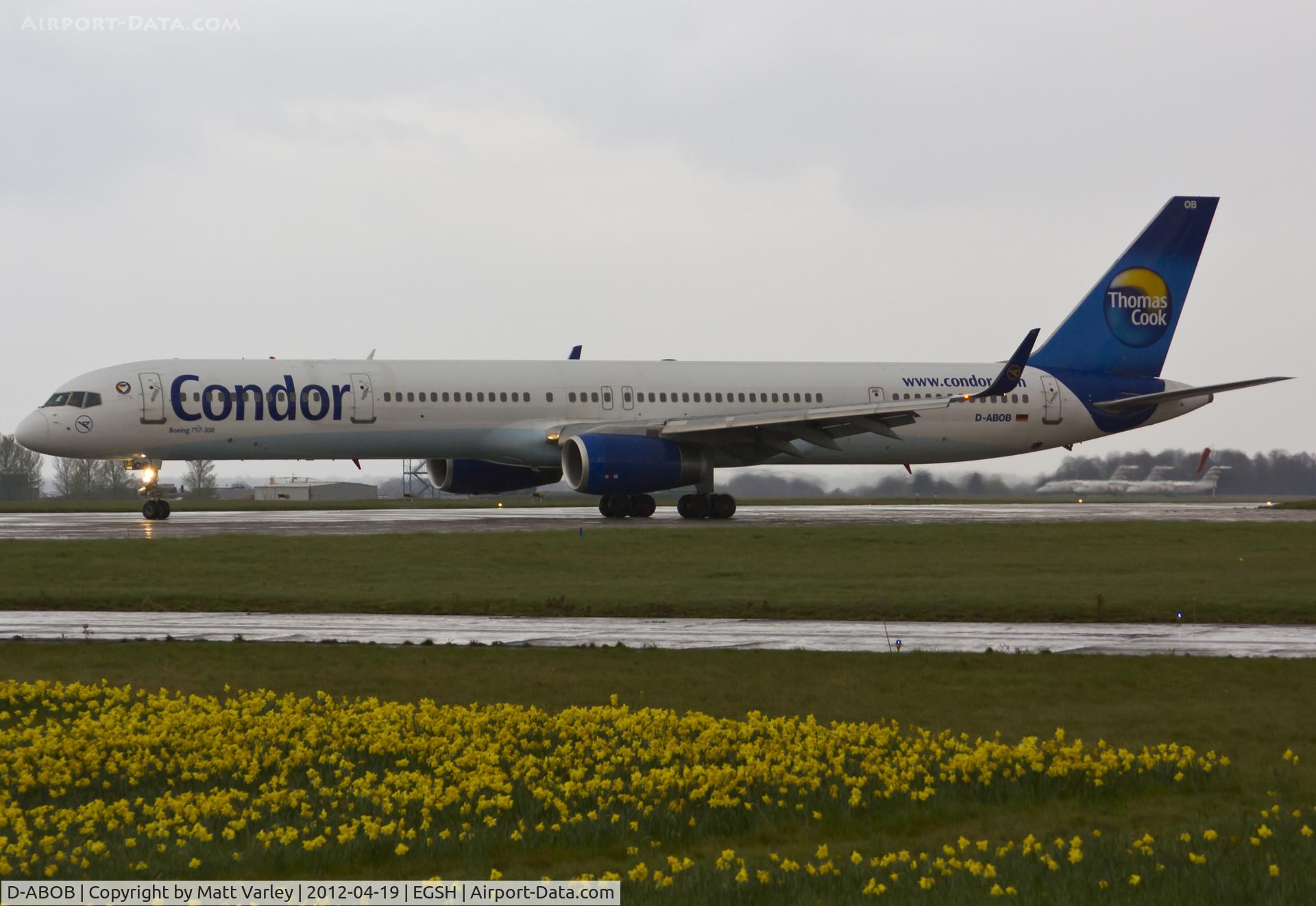 D-ABOB, 1998 Boeing 757-330 C/N 29017, Arriving at EGSH in wet conditions for spray by Air Livery.