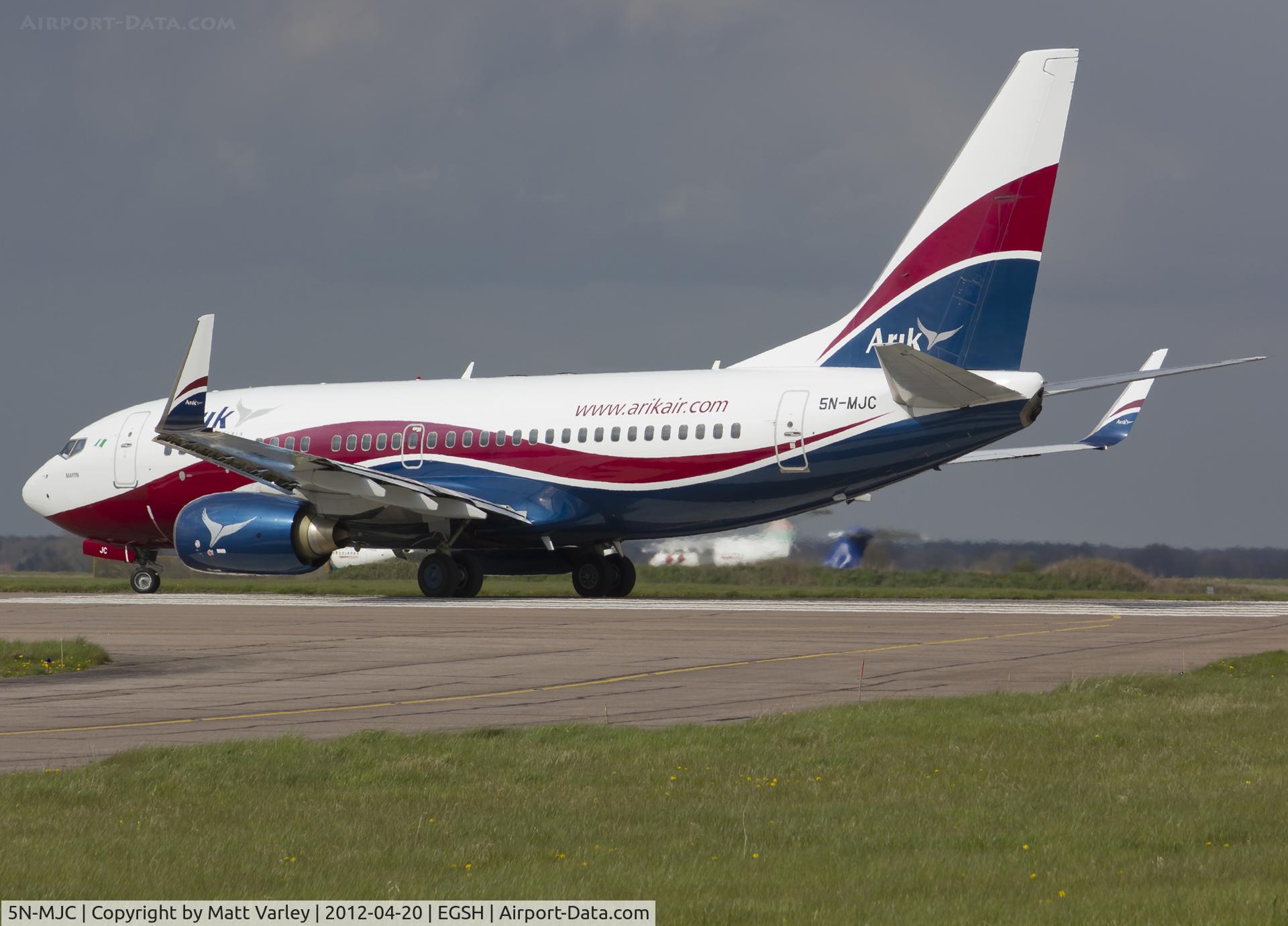 5N-MJC, 2007 Boeing 737-7BD C/N 33932, About to depart EGSH after engineering and spray.