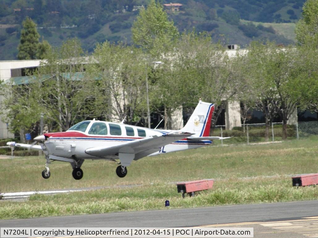 N7204L, 1984 Beech B36TC Bonanza C/N EA-431, Landing on 26L