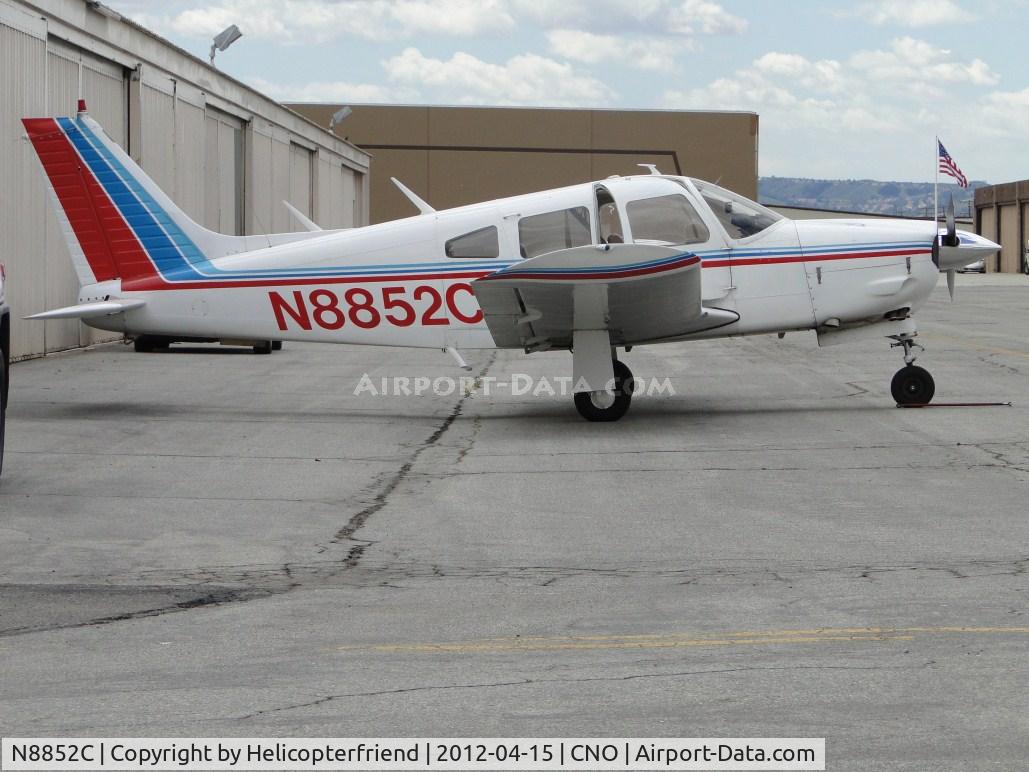 N8852C, 1976 Piper PA-28R-200 C/N 28R-7635184, Parked by a hanger