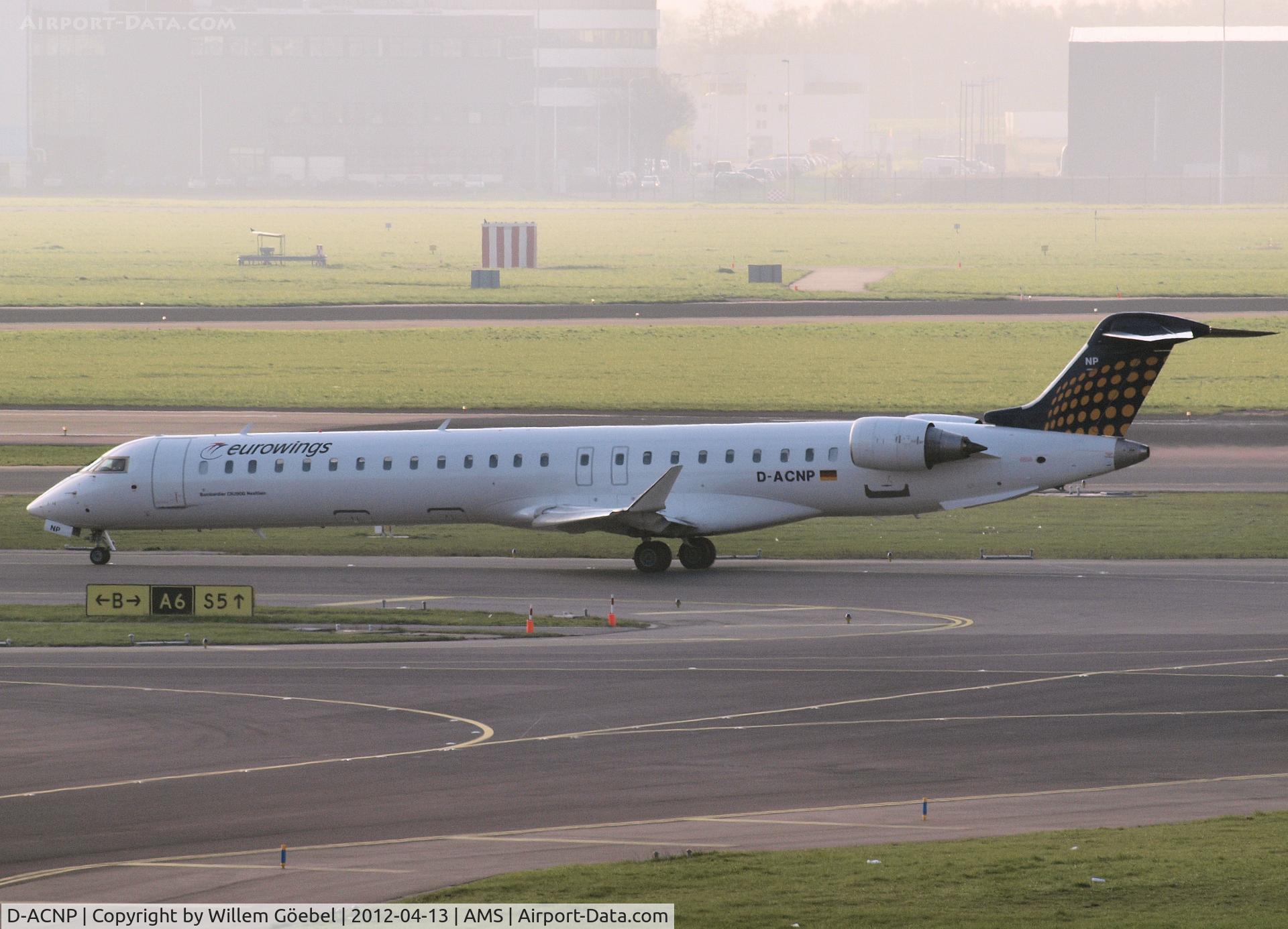 D-ACNP, 2010 Bombardier CRJ-900LR (CL-600-2D24) C/N 15259, Taxi to the runway L18 of Amsterdam Airport