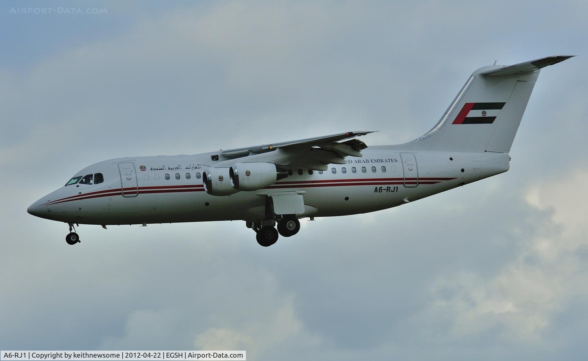 A6-RJ1, 1998 British Aerospace Avro 146-RJ85A C/N E2323, Landing onto 27 in difficult light !